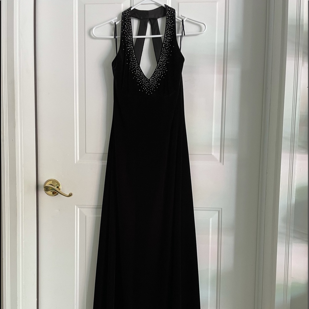 Full length black velvet dress w/accent beading. Keyhole back